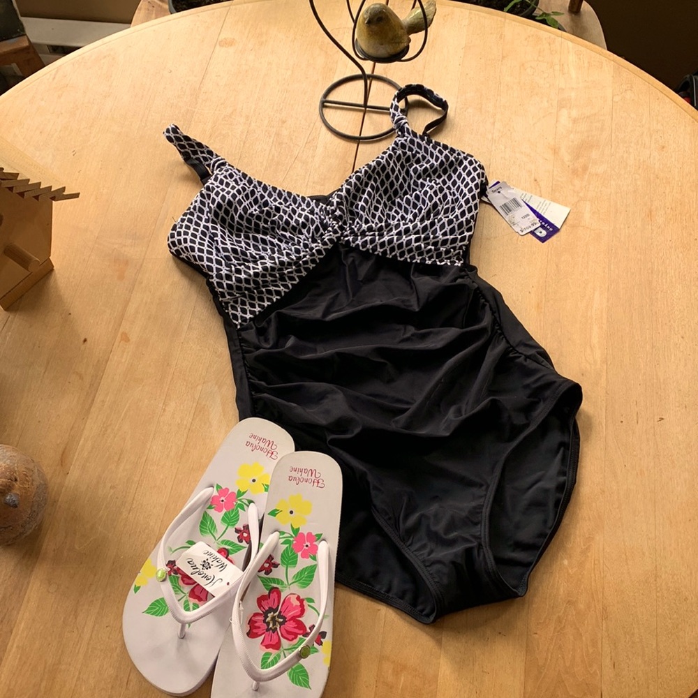 Bathing suit with floating bra . DD cup ( fits more like D) NWT!